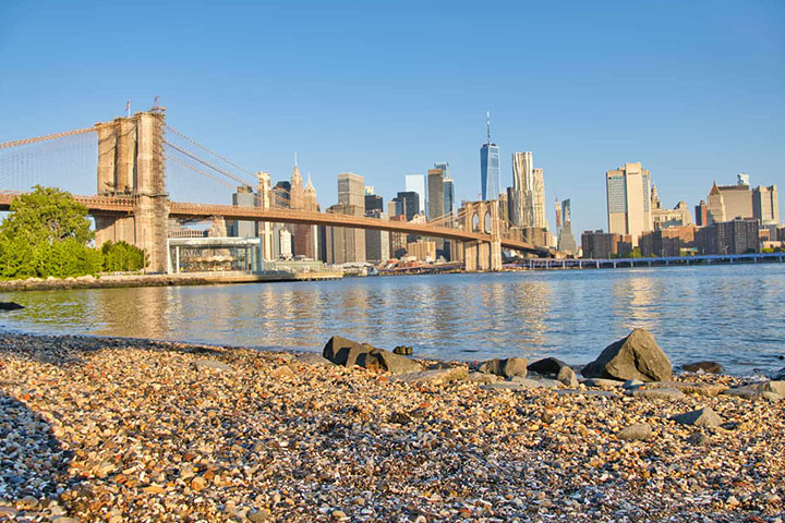 Visit the Pebble Beach Park on Brooklyn Side near the Bridge 