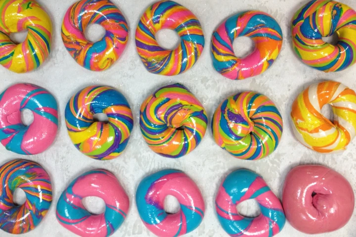 27. Taste the NYC’s Famous Rainbow Bagels at Liberty Bagels
